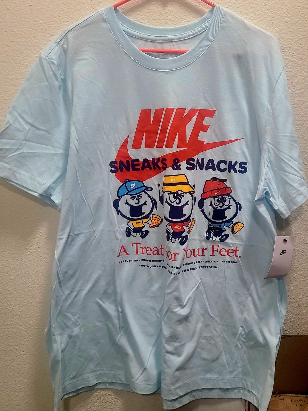 Nike Light Blue 'Sneaks & Snacks' Graphic Short Sleeve Tee